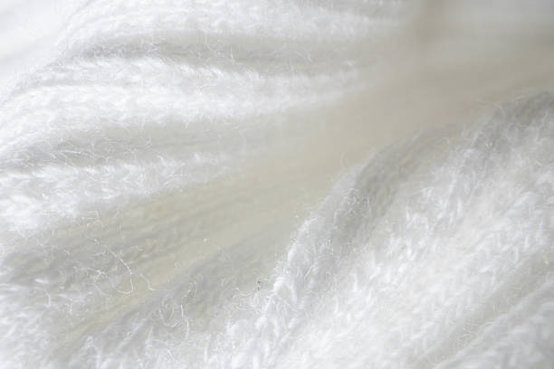 Macro Texture of Ribbed Knit Fabric. grey 11-4201.