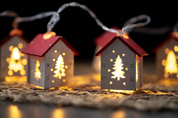 istock Christmas decorative houses with warm lights 2252007238