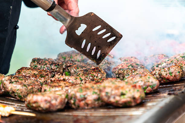 Cooking and bbqing burgers outside