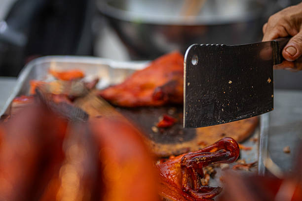Roasted ducks sales on Asian street food market stand.Chartered walking street, Phuket Town.Thailand.