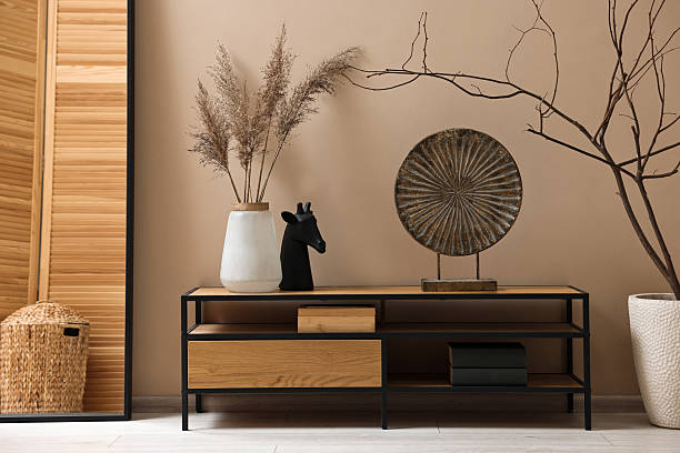 istock Console table and decor near dark beige wall in room. Interior design 2252008239