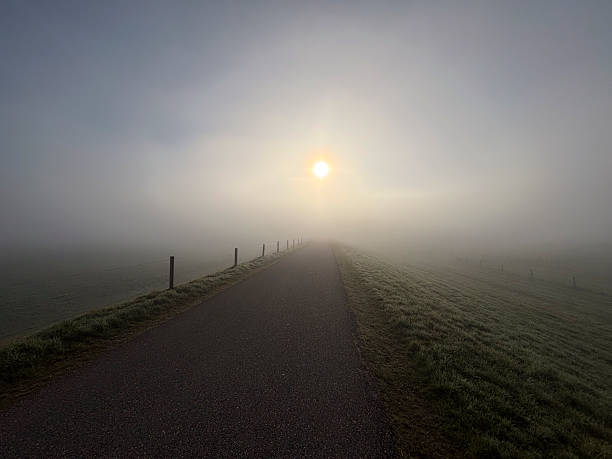 Sunrise over the river IJssel levee near Zwolle during a beautiful morning
