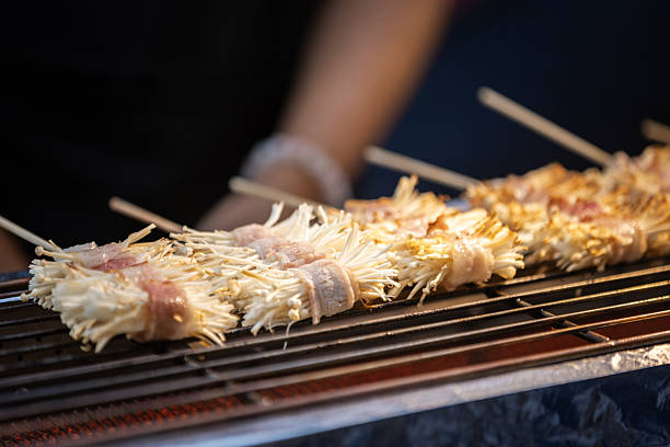 Asian food market view with barbecue grill.Phuket Island - Thailand.