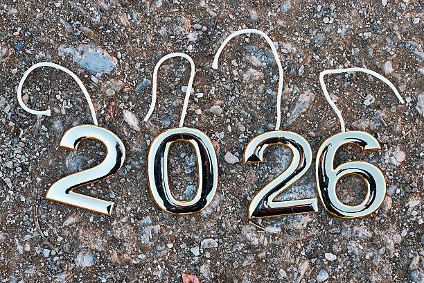 istock New Year 2026 Celebration Theme With Shiny Numbers On Ground for Year Milestone 2252013859