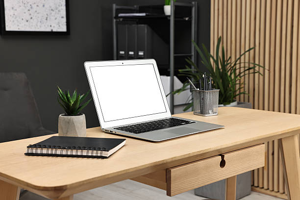 istock Comfortable workplace with modern laptop on wooden table indoors 2252013931