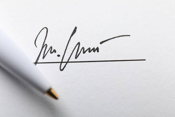 istock Signature and pen on paperwork, closeup view 2252014510