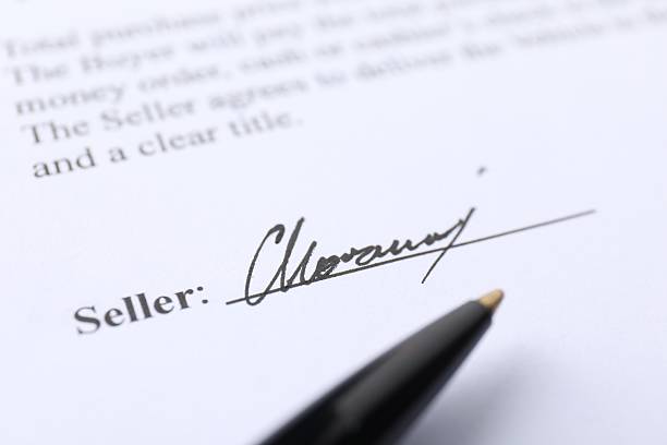 istock Signature and pen on paperwork, closeup view 2252014540