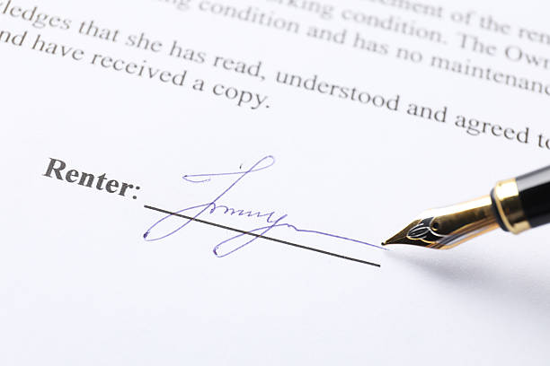 istock Fountain pen leaving signature on contract, closeup 2252014598