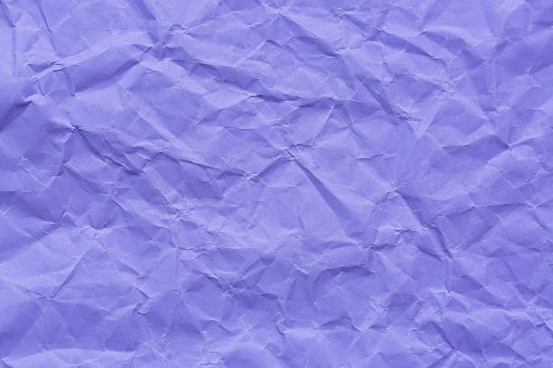 istock Purple crumpled paper surface macro,Abstract light lilac paper texture background. Texture of crumpled craft paper. Paper background. Recycled lilac paper backdrop in close up. purple Textures. Wallpaper. 2252014762
