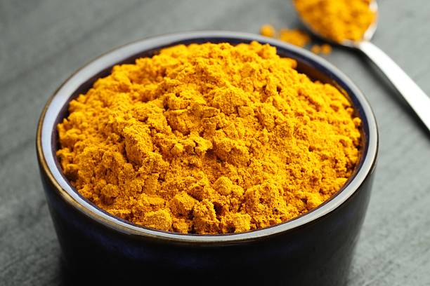 istock Turmeric powder in bowl on grey table, closeup 2252015190