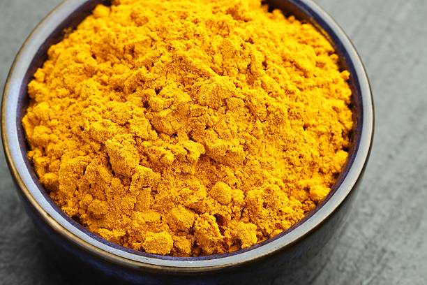 istock Turmeric powder in bowl on grey table, closeup 2252015242