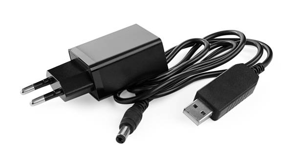 istock Black USB power adapter and charge cable isolated on white 2252017788