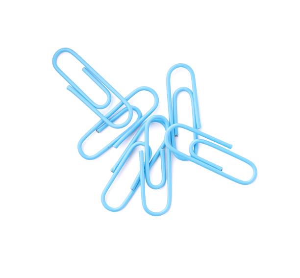 istock Bright paper clips isolated on white, top view 2252018577