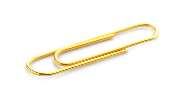 istock One bright paper clip isolated on white 2252018578