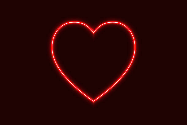 istock Glowing red neon heart on a black background, Symbol of love. 2252023231