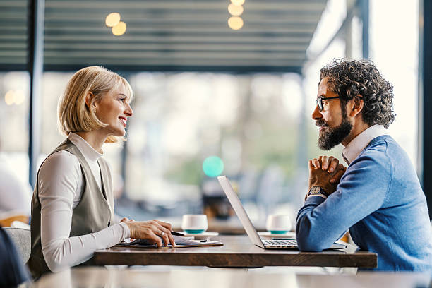 istock Business people having a coffee shop interview meeting 2252028365