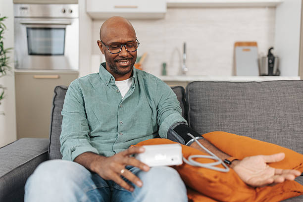 istock Man Checking Blood Pressure with a Smile 2252031505