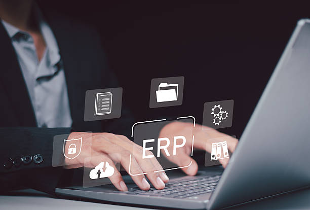 istock ERP, Enterprise resource planning concept. Connections between business intelligence, HR and CRM modules. Businessman use smartphone to analyzing ERP system on virtual screen. 2252033517