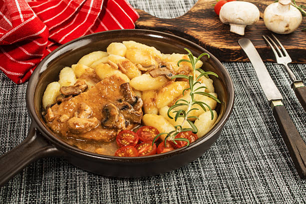 istock Braised pork chop with mushrooms. 2252049060
