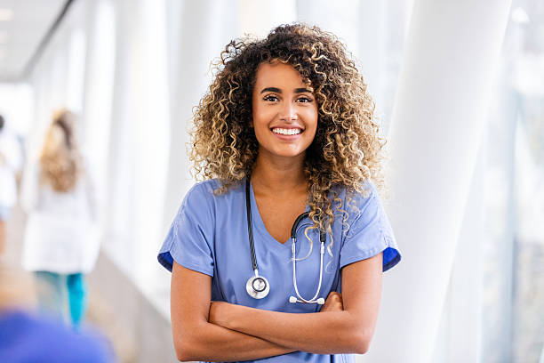 istock Cheerful nurse in hospital corridor 2252049757