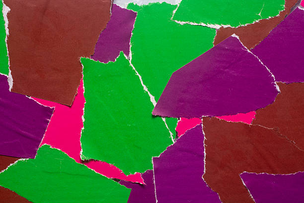 istock abstract background of scraps of multi-colored paper 2252052483