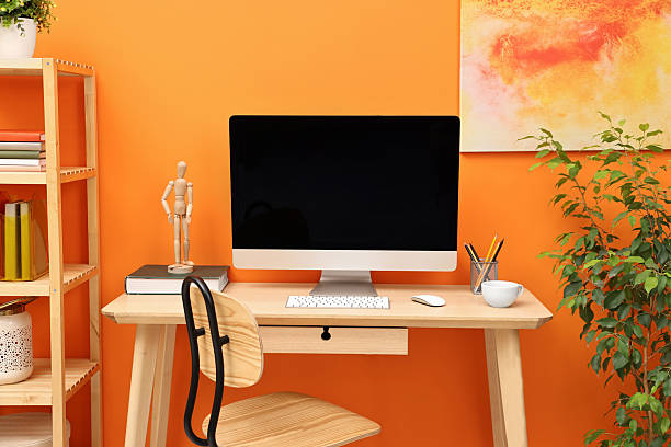 istock Comfortable workplace with modern computer and stationery on wooden table indoors 2252054545