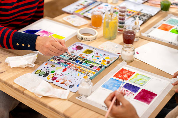 istock Adults learning watercolor painting during art workshop 2252055181