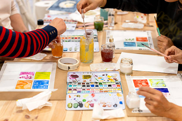 istock People learning watercolor painting at creative workshop 2252055187