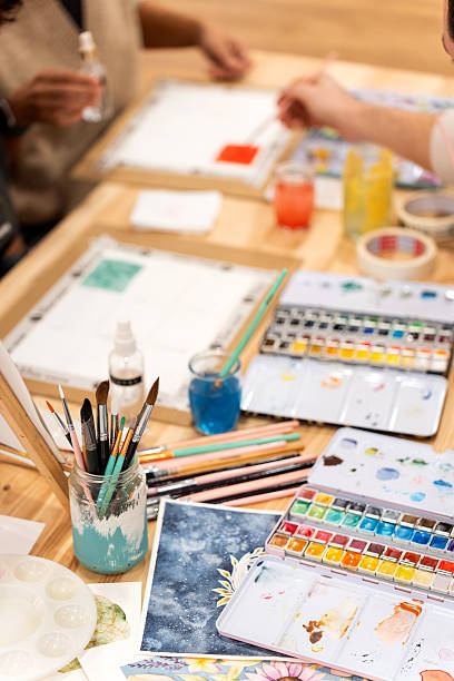 istock People attending watercolor painting workshop learning art skills 2252055191