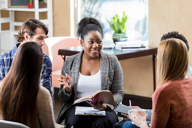 istock Therapist leads engaging discussion, fostering connection and understanding among diverse group members. 2252056079