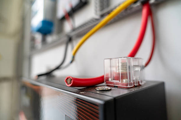 istock Electrical circuit with red cable, copper wire, and transparent fuse 2252058373