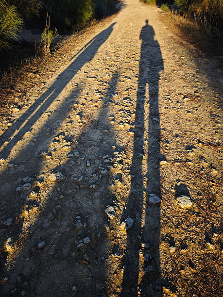 istock Silhouettes of hikers 2252061611