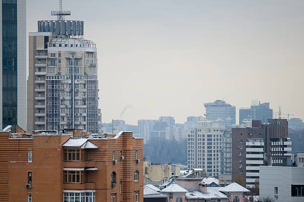 istock Winter rooftops and modern residential towers in Kyiv 2252062942