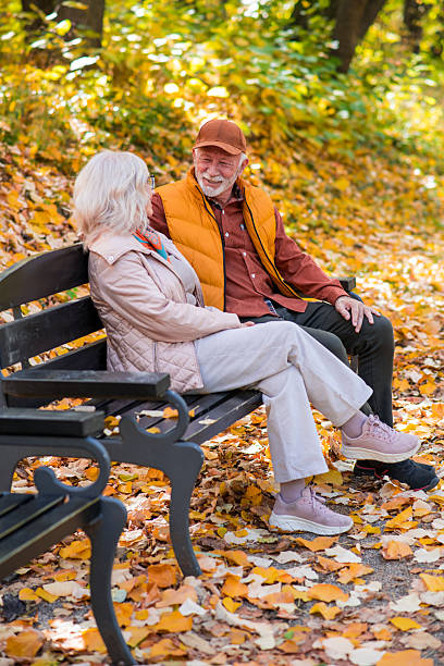 istock Retired couple smiling together outside 2252066600