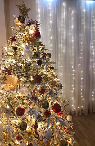 istock Beautiful Christmas tree in the room at night 2252067011