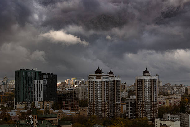 istock Heavy dark storm clouds over city skyline 2252068890