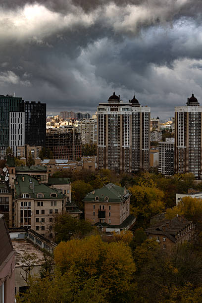 istock Dramatic storm clouds over residential towers 2252068891