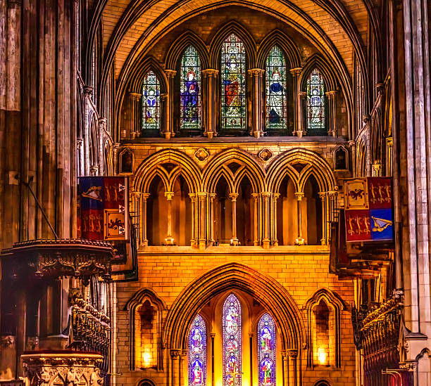 St Patrick's Cathedral Basilica Altar Stained Glass Dublin Ireland. St Patrick is near the site where the St Patrick baptised Christians from a nearby well. Originally built in 1200s. Completely restored in 1860.