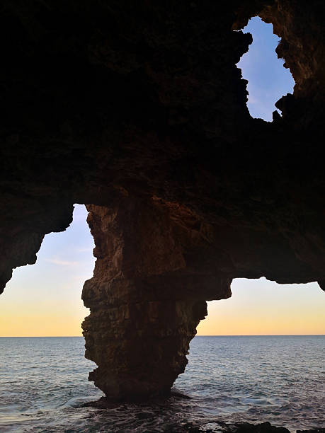 istock Sea Sunset through a cave in Costa Blanca 2252072095