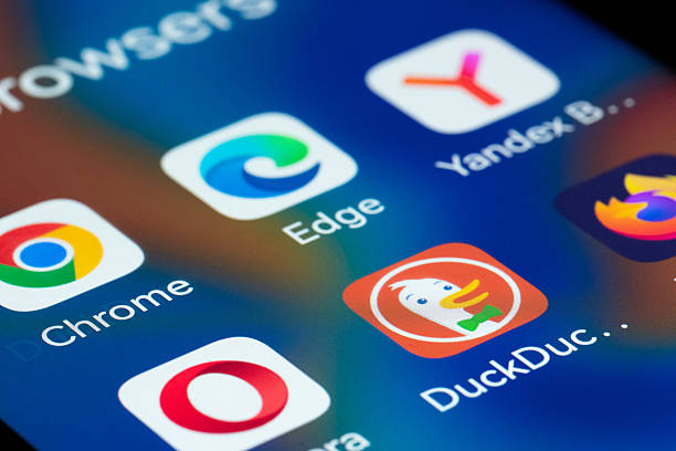 Istanbul, Turkey  December 15: Close-up view of smartphone screen showing popular internet browser applications including Google Chrome, Opera, Firefox, Yandex Browser, and DuckDuckGo. Concept of web browsing, online search, digital technology, and mobile internet usage.