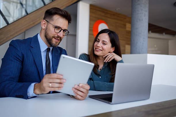 istock Business colleagues collaborating on digital tablet and laptop, planning future corporate strategies 2252082184
