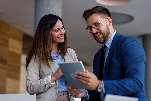 istock Business colleagues collaborating on an important project, discussing strategy and reviewing data on a digital tablet 2252082686
