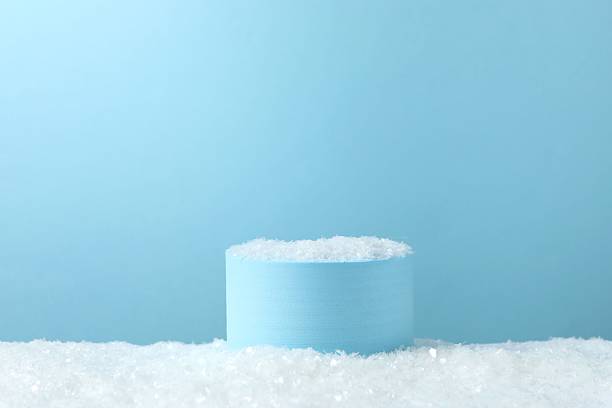 istock Beautiful composition with podium and white snow 2252083106