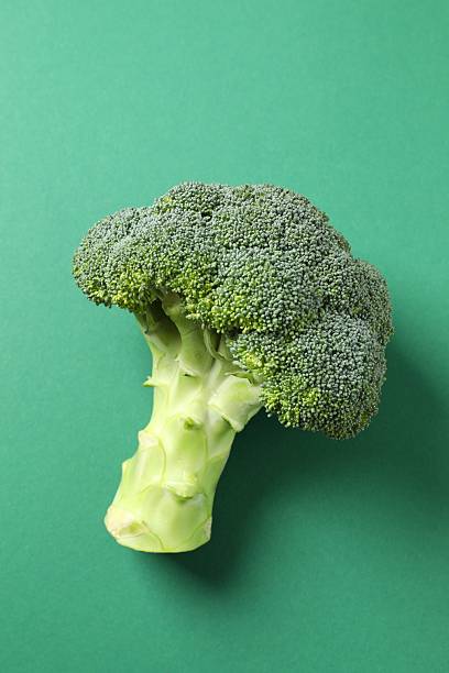 istock Fresh green broccoli on color table 2252087870