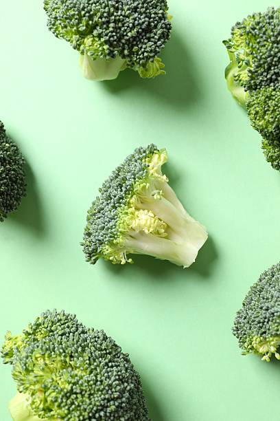 istock Fresh green broccoli on color table 2252087920