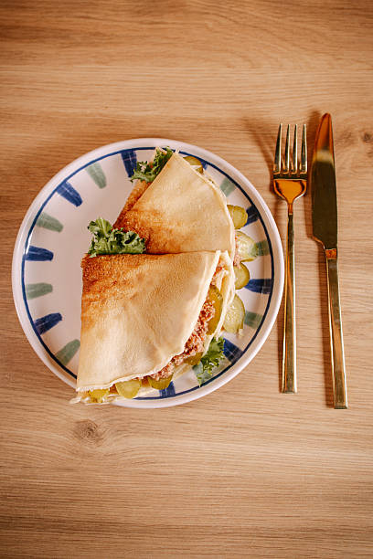 istock Savory crepes with meat filling flat lay 2252087953