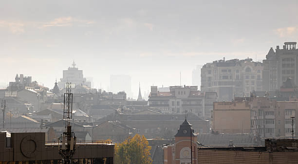 istock Hazy urban skyline with layers of historical rooftops and smog 2252088452