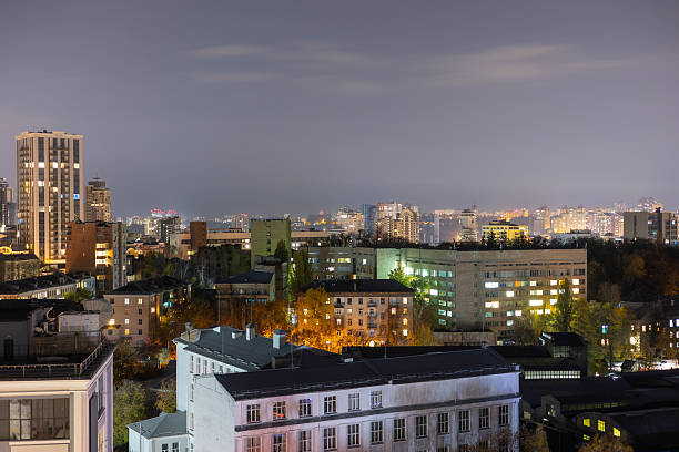 Ekaterinburg, Russia - November 07, 2012 - Aerial night view of illuminated cityscape with buildings and streets.