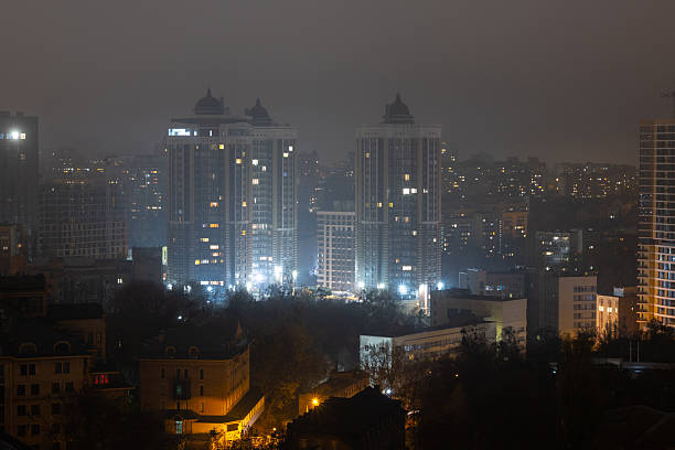 istock Modern high-rise buildings in night autumn mist 2252089333