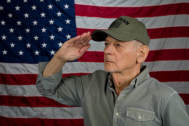 istock American Senior Veteran looking away saluting 2252091340